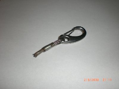 The broken cable and luff line catch.