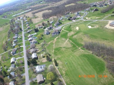 On final to the closest green between the sand traps.